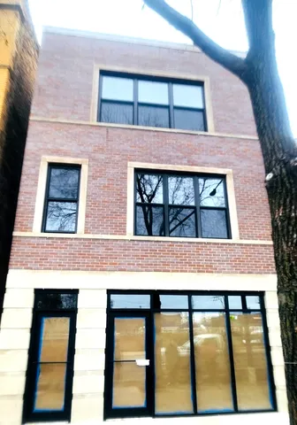 a view of building with a balcony