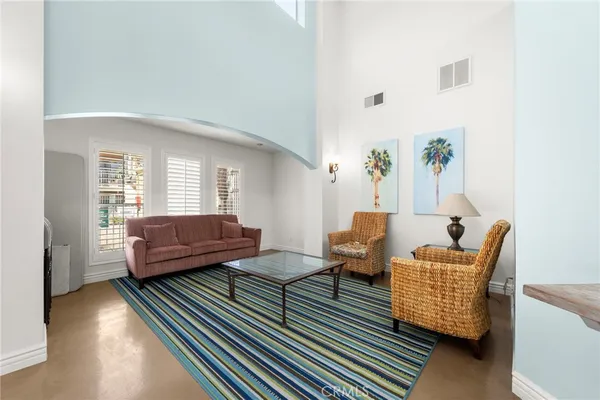 a kitchen with granite countertop cabinets stainless steel appliances and a sink