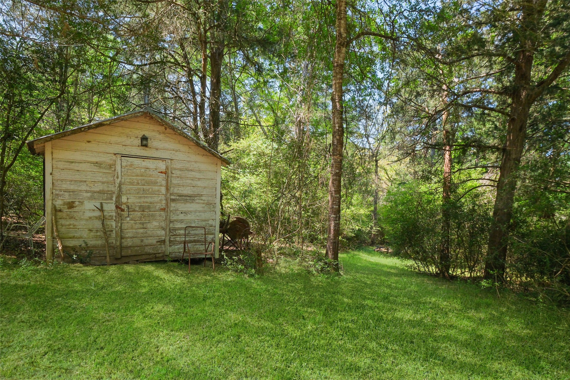 24718 Squirrel Road New Ulm, TX 78950 - Photo 23 of 26 a front view of a house with a yard
