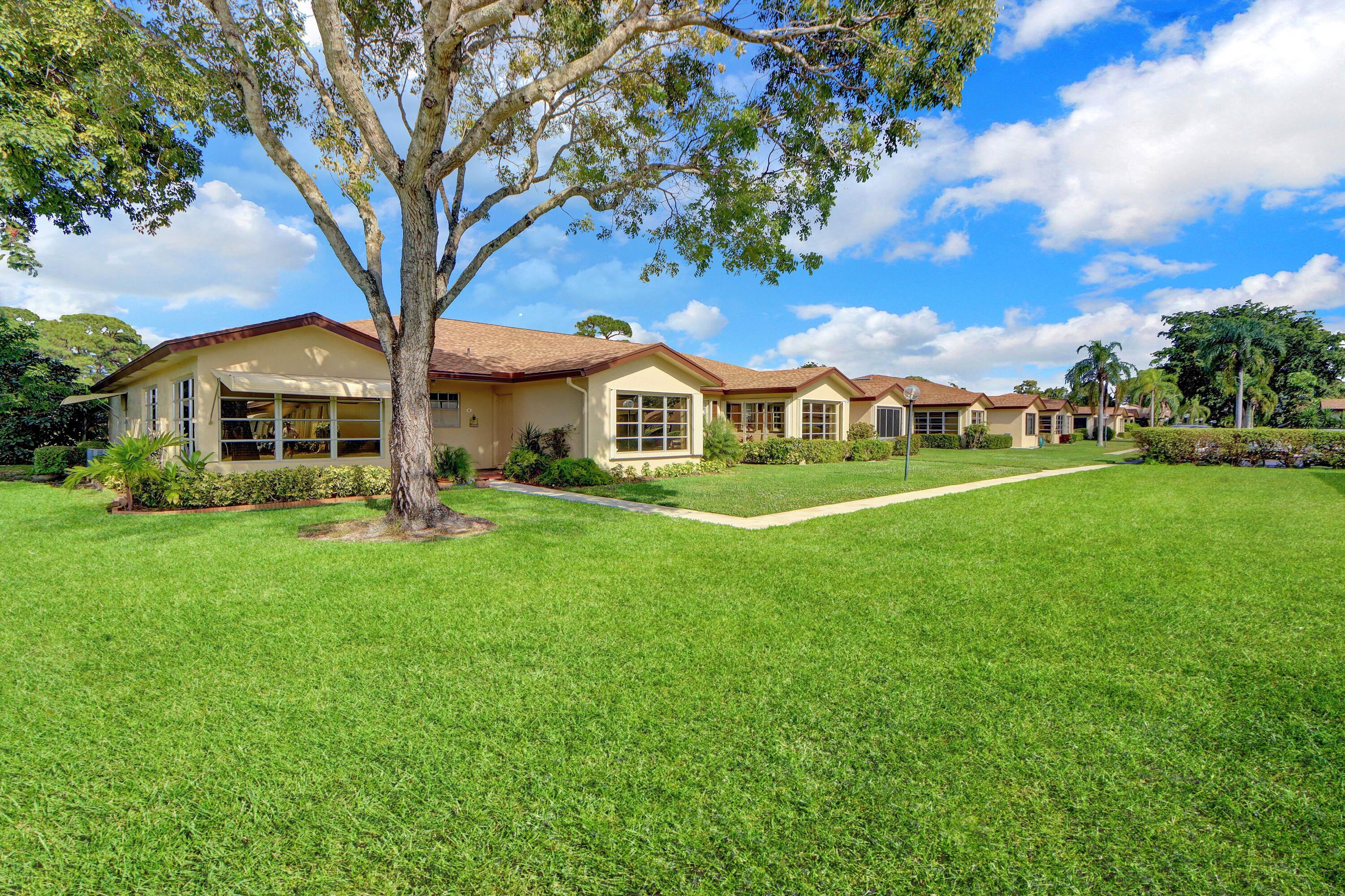 14050 Nesting Way, Unit B Delray Beach, FL 33484 - Photo 2 of 18 Front Elevation - 2