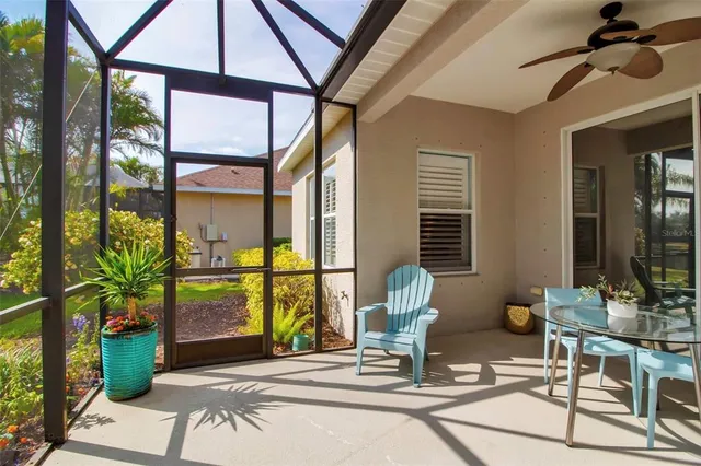 a view of a lake with houses in the background