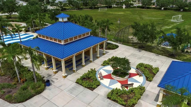 a table and chairs sitting in the garden