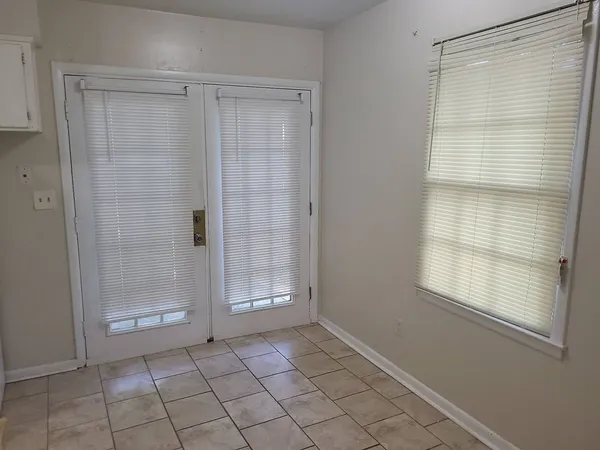 a view of an empty room with window