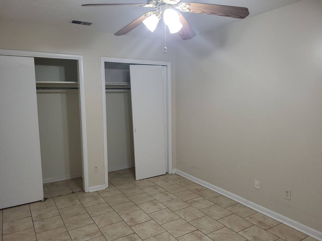 3541 13th Avenue, Unit B Columbus, GA 31904 - Photo 5 of 8 an empty room with closet area