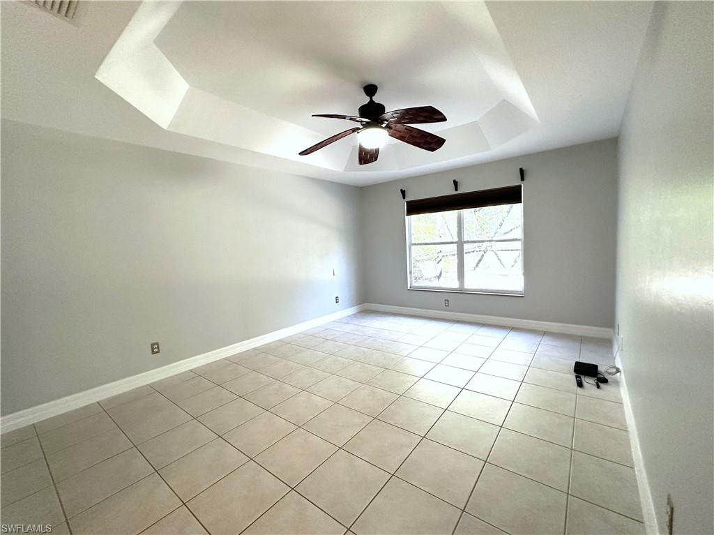 1356 Triandra Lane Naples, FL 34119 - Photo 14 of 38 a view of an empty room with a window