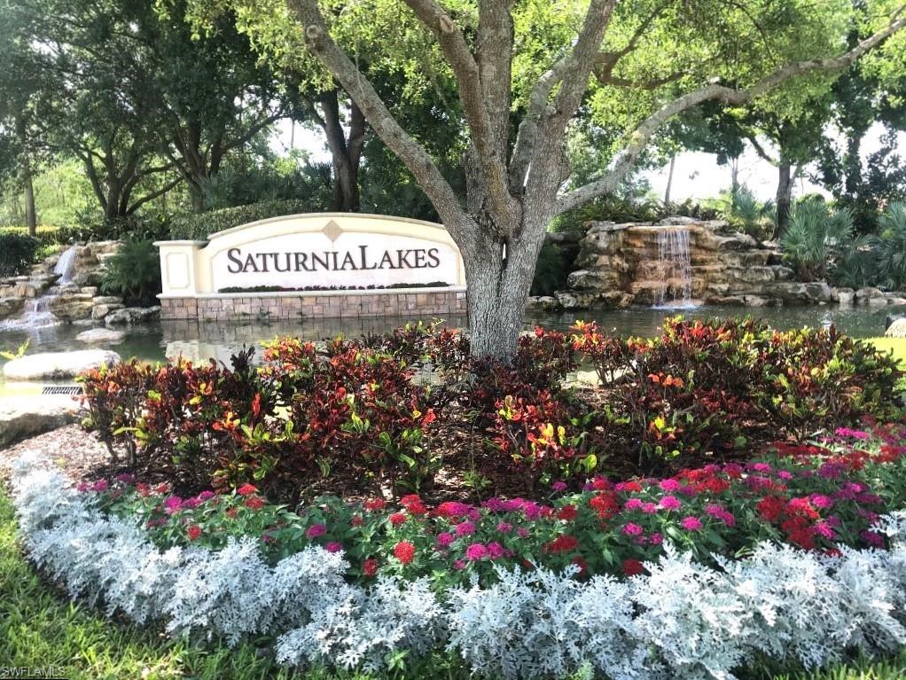 1356 Triandra Lane Naples, FL 34119 - Photo 31 of 38 a sign on the side of a road
