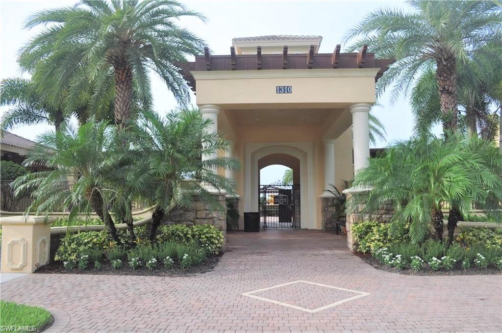 1356 Triandra Lane Naples, FL 34119 - Photo 33 of 38 a front view of a house with garden