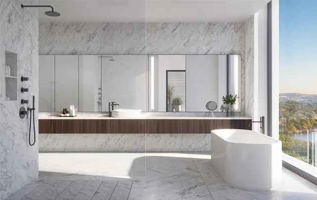 a living room with a couch and a large window