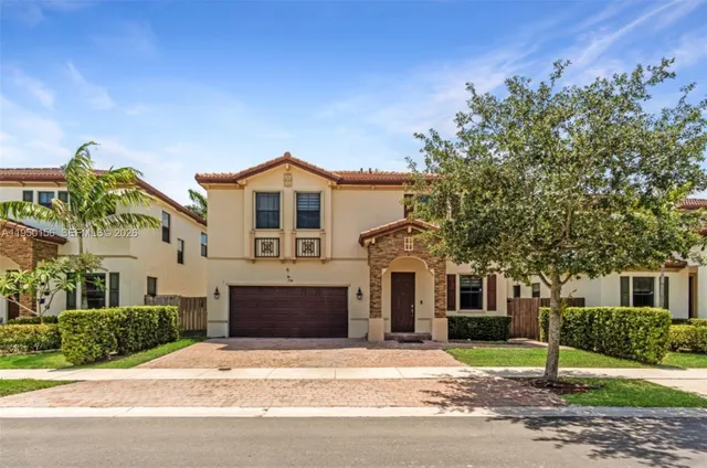 front view of a house with a street