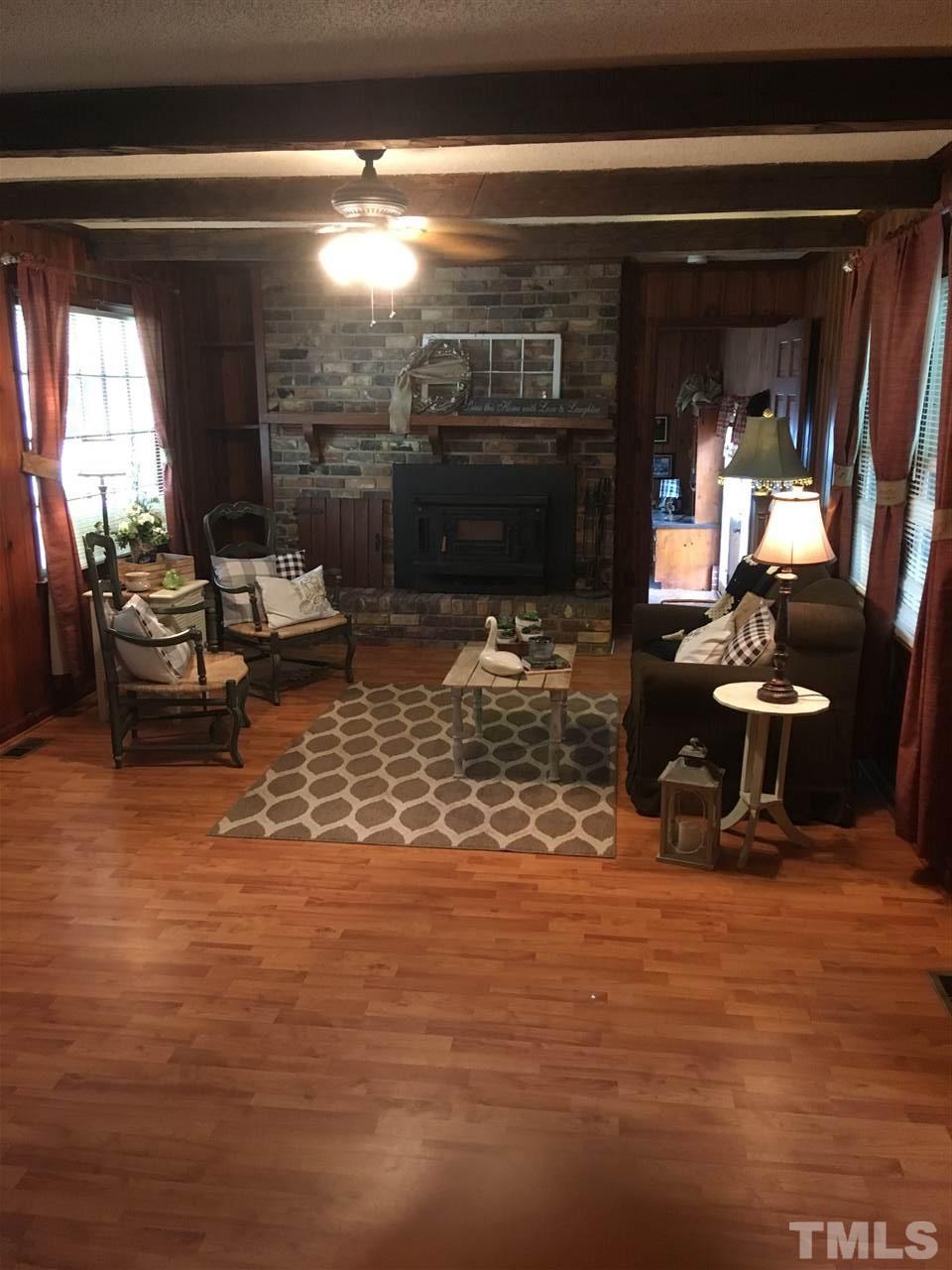 518 Pilot-Riley Road Zebulon, NC 27597 - Photo 19 of 25 a living room filled with furniture