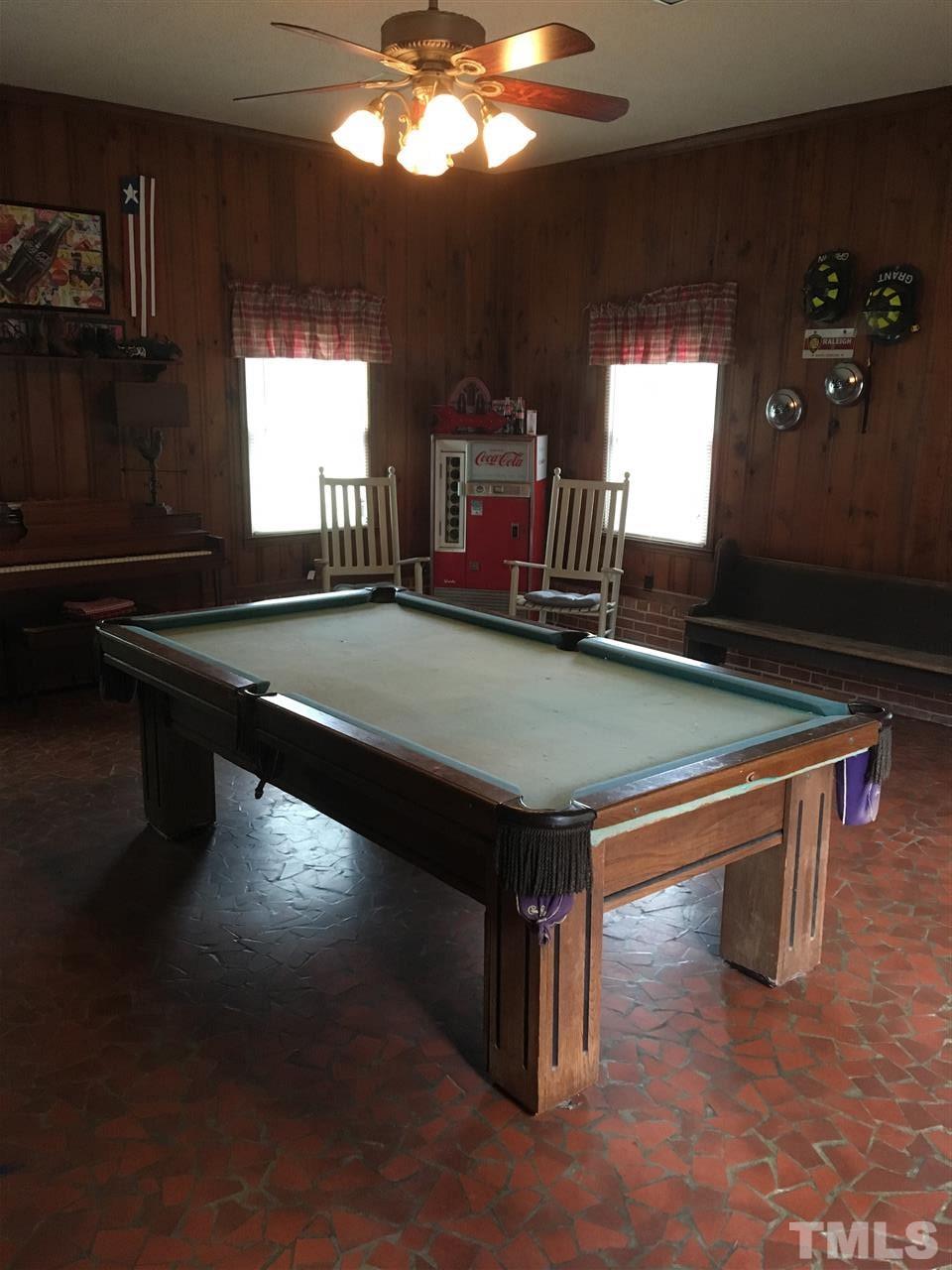 518 Pilot-Riley Road Zebulon, NC 27597 - Photo 24 of 25 a room with pool table and windows