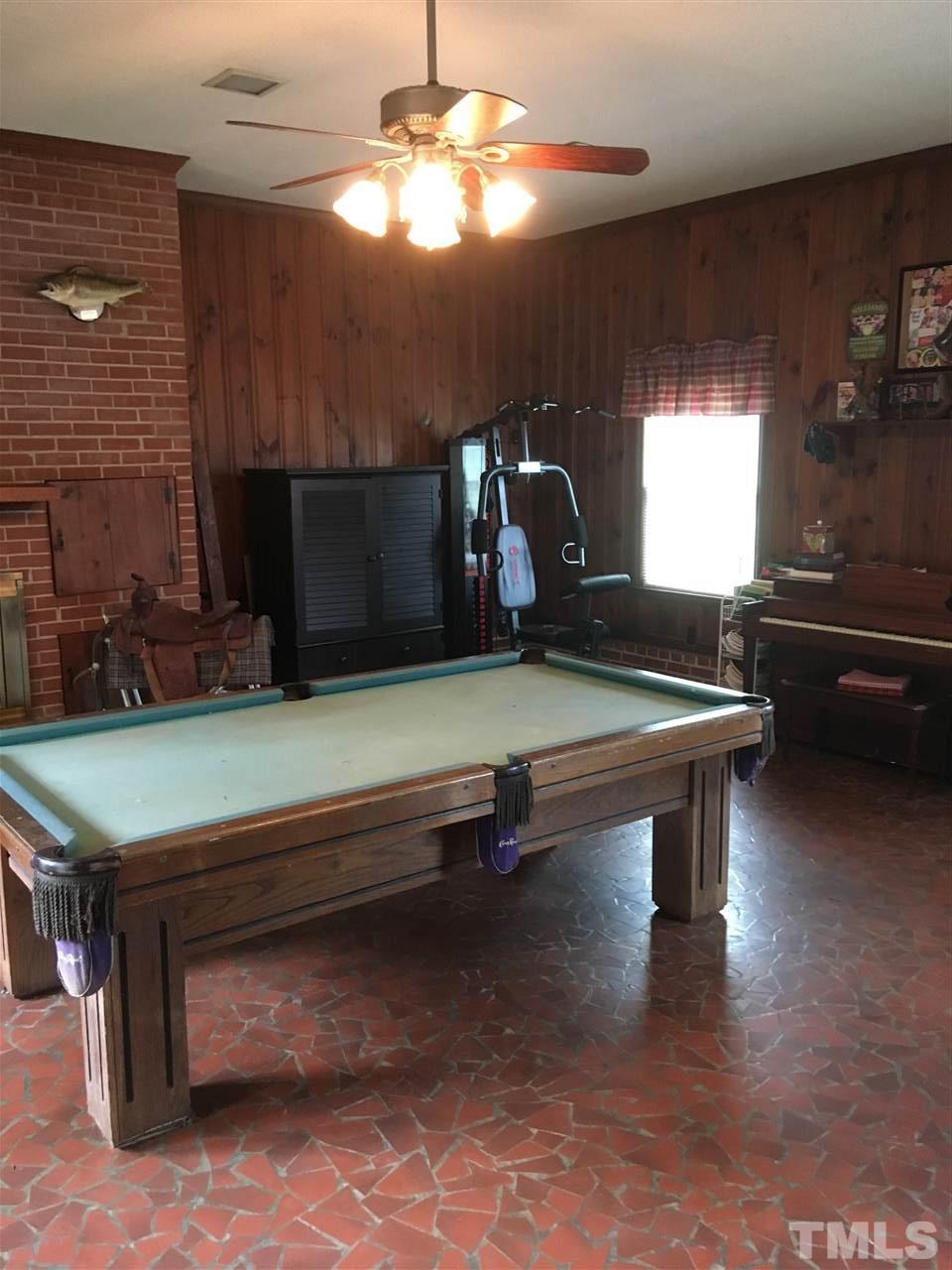 518 Pilot-Riley Road Zebulon, NC 27597 - Photo 25 of 25 a room with pool table and windows