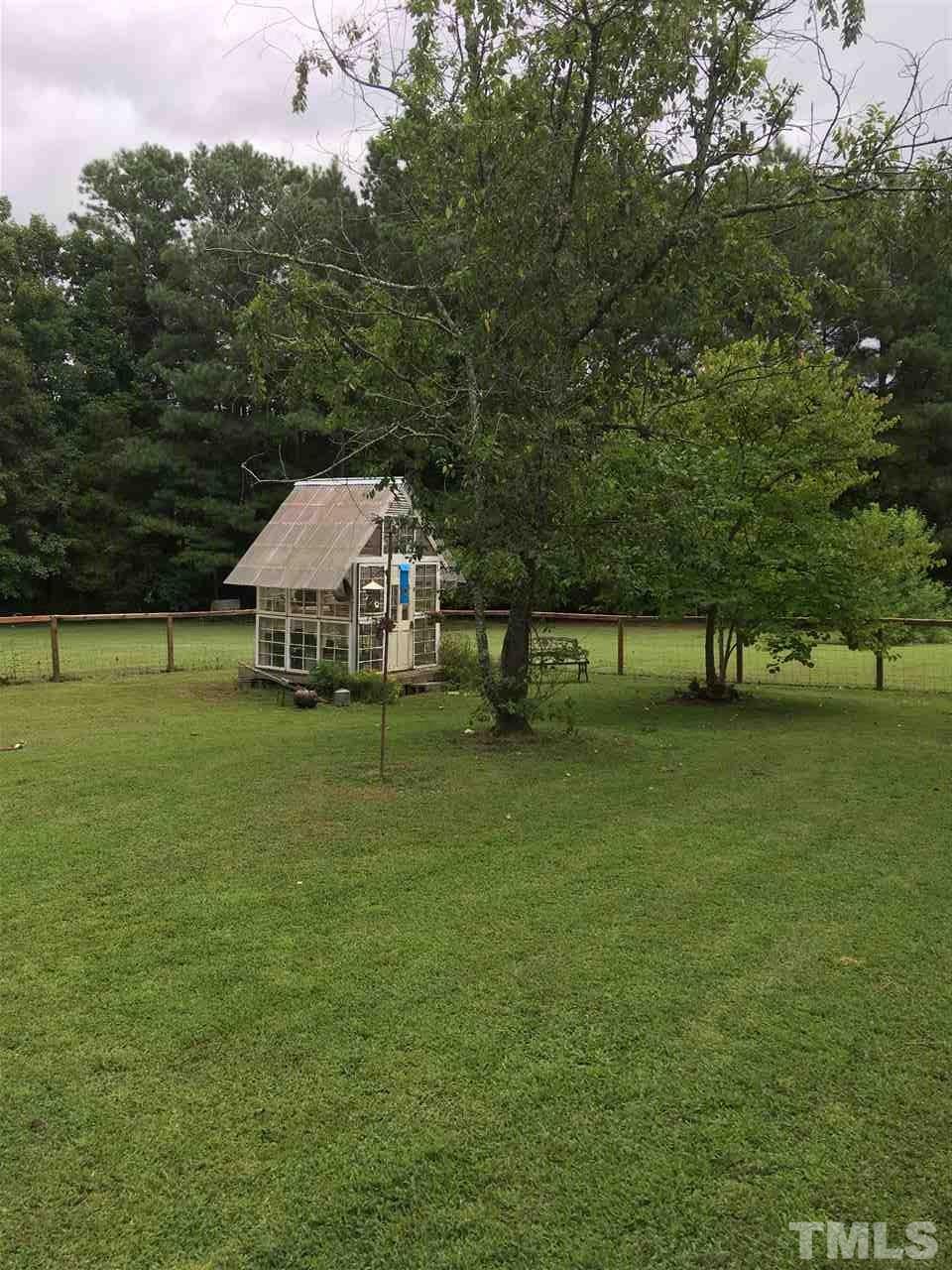 518 Pilot-Riley Road Zebulon, NC 27597 - Photo 10 of 25 a view of a house with a yard