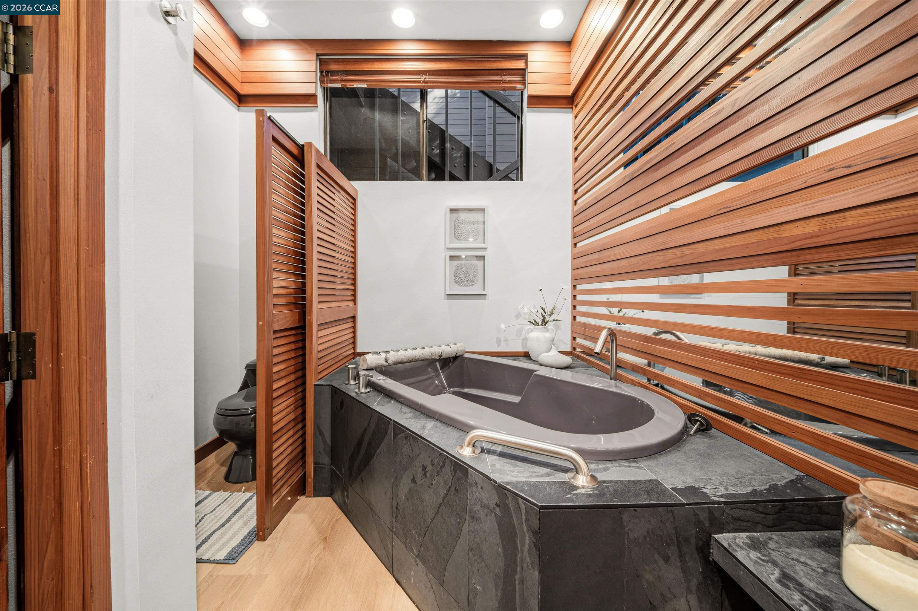 841 Kirkcrest Road Alamo, CA 94507 - Photo 42 of 62 a bathroom with a sink and granite