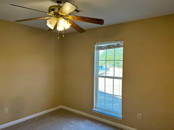 a window in an empty room