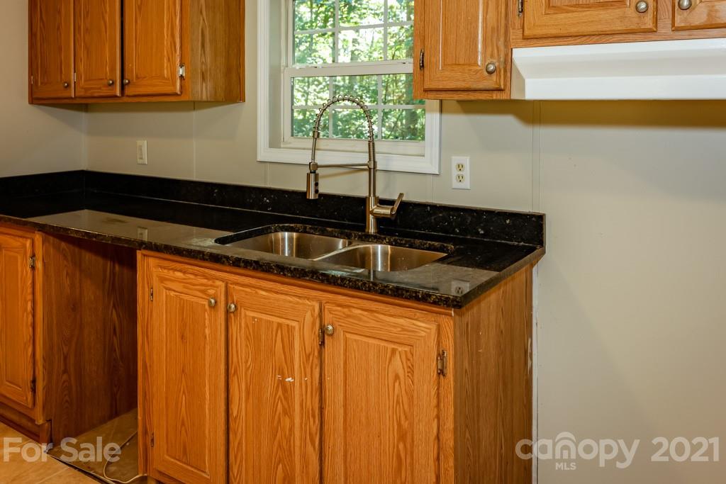 525 Hamilton Road Rutherfordton, NC 28139 - Photo 14 of 39 a kitchen that has a sink and a window