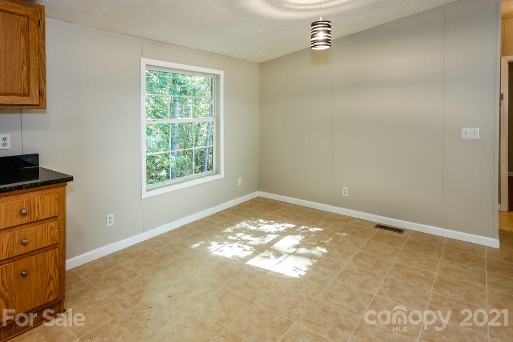 525 Hamilton Road Rutherfordton, NC 28139 - Photo 16 of 39 an empty room with a window