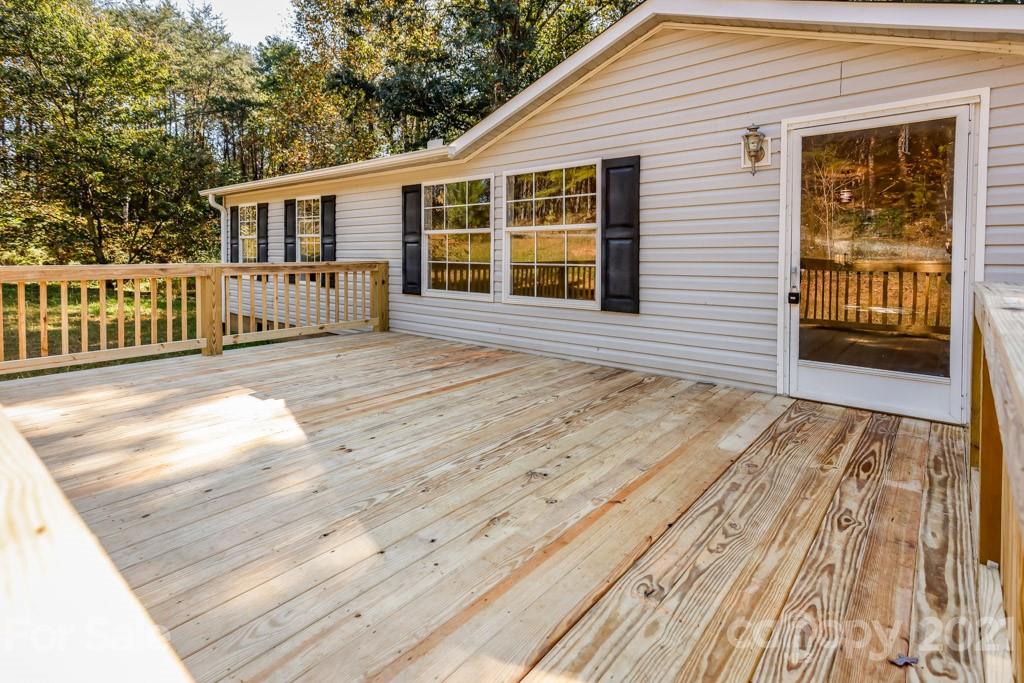 525 Hamilton Road Rutherfordton, NC 28139 - Photo 4 of 39 a view of backyard with deck and wooden floor
