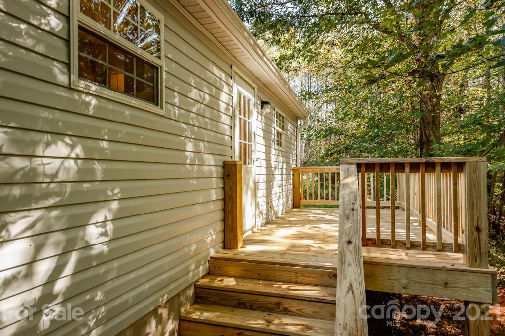 525 Hamilton Road Rutherfordton, NC 28139 - Photo 7 of 39 a view of a house with a large window