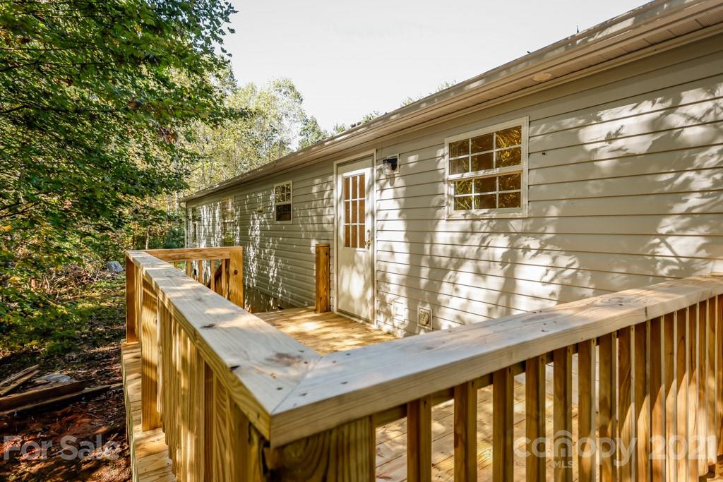 525 Hamilton Road Rutherfordton, NC 28139 - Photo 8 of 39 a balcony view with a outdoor seating