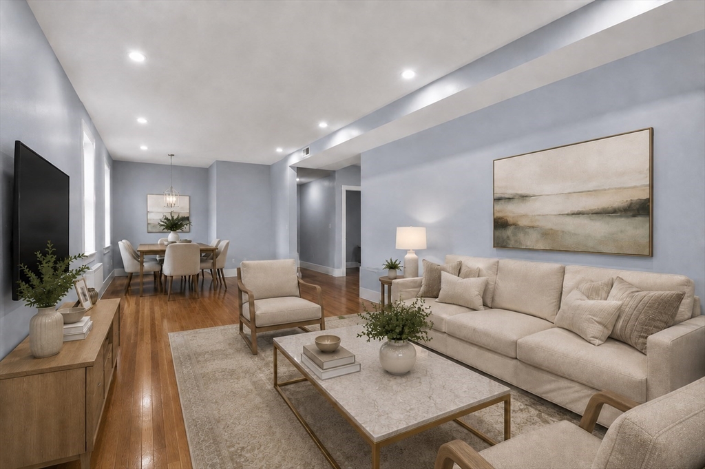 31 Homestead Street, Unit 2 Boston, MA 02121 - Photo 6 of 21 a living room with furniture and a flat screen tv