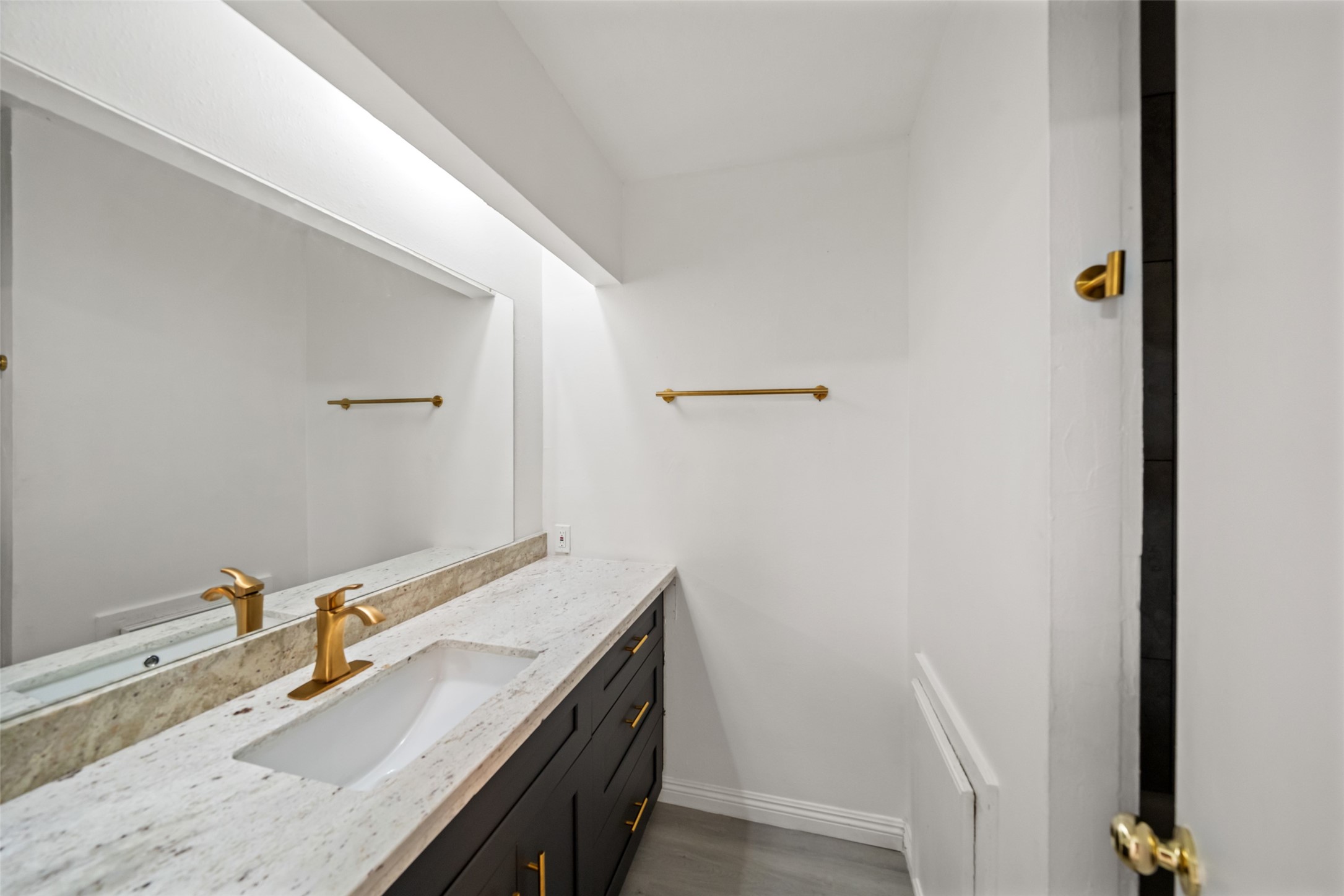 5726 Yorkgate Drive Spring, TX 77373 - Photo 15 of 20 a bathroom with a sink and a mirror