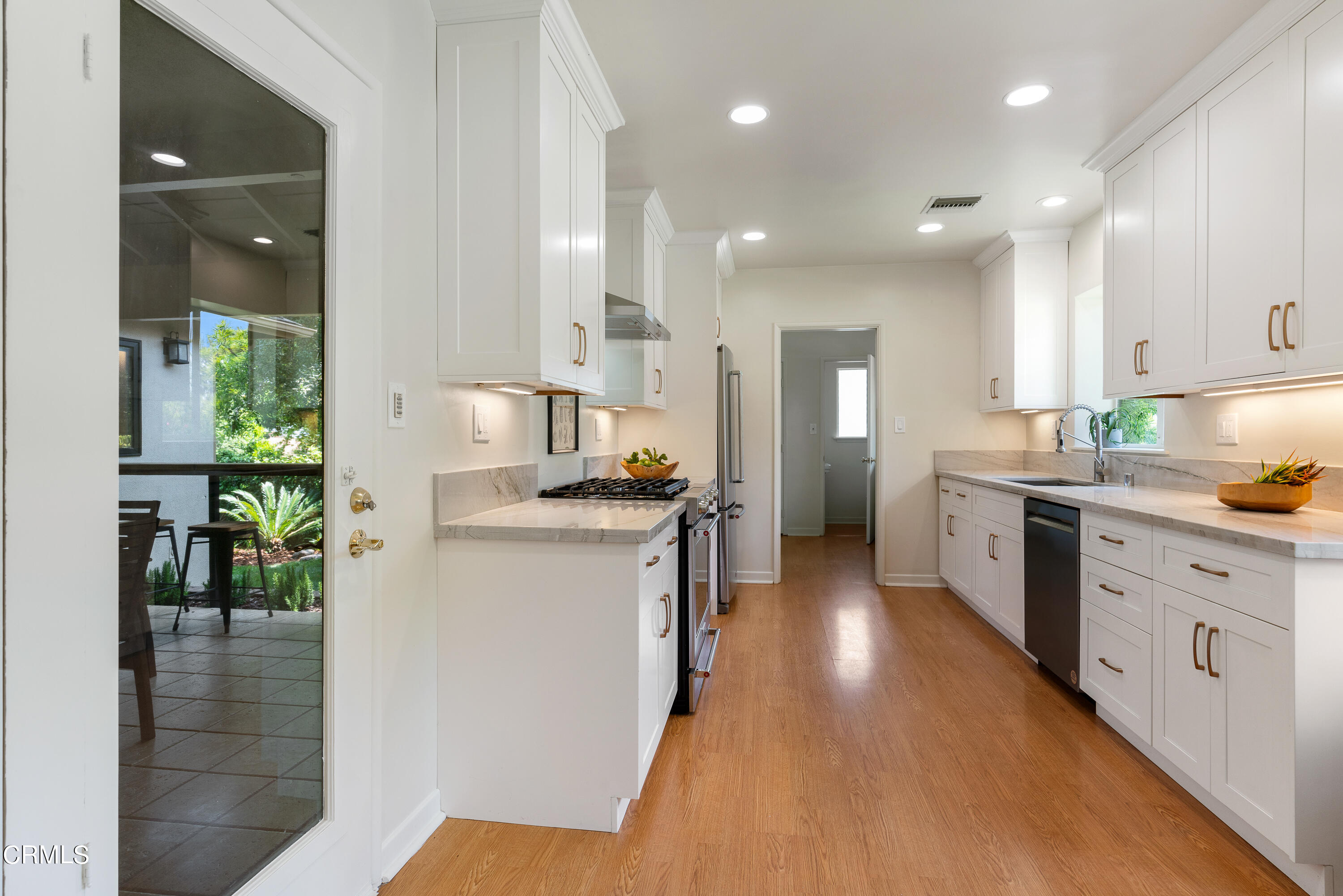2155 Canyon Close Road Pasadena, CA 91107 - Photo 17 of 41 a kitchen with a refrigerator a sink and a stove top oven