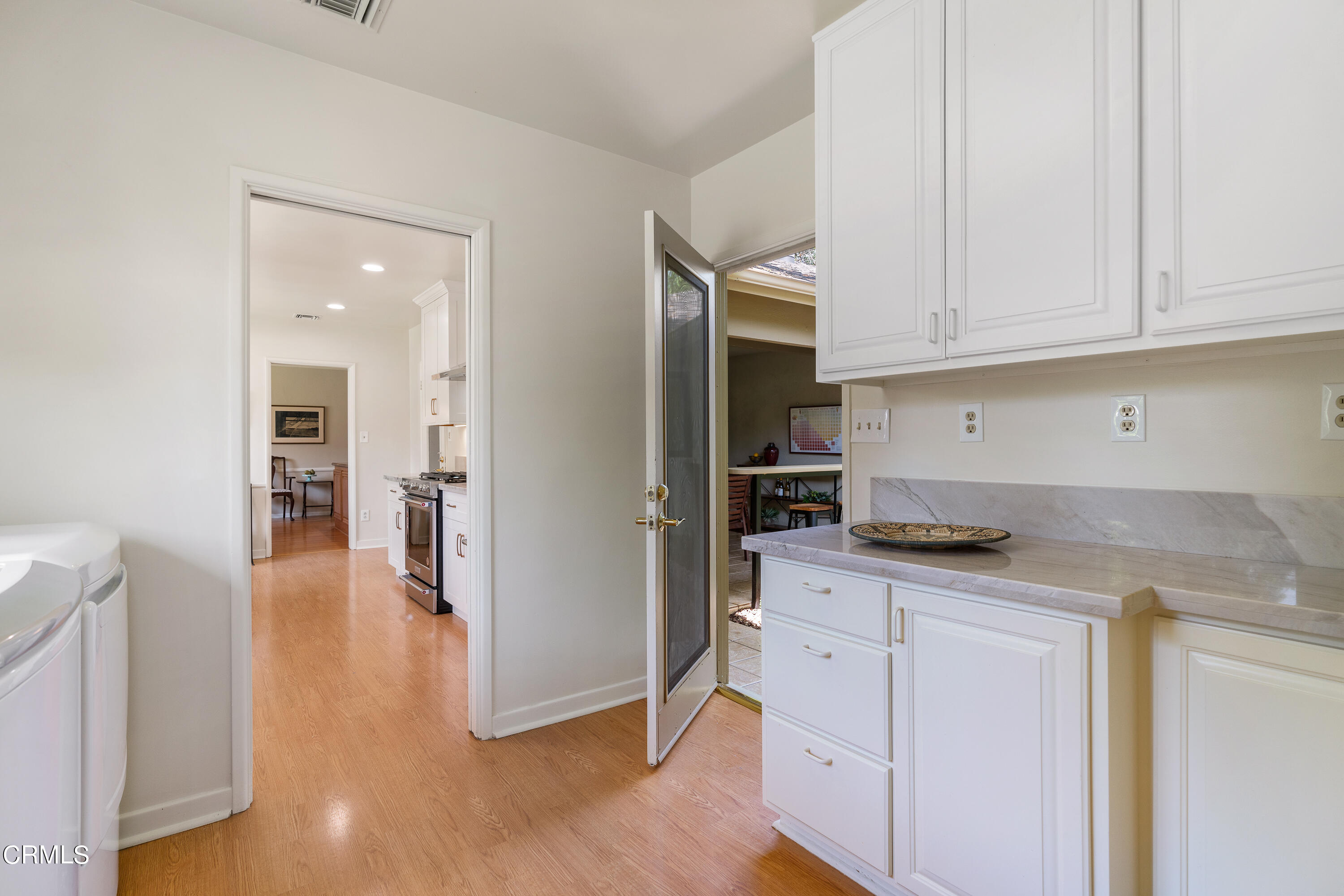 2155 Canyon Close Road Pasadena, CA 91107 - Photo 21 of 41 a kitchen with granite countertop a sink and cabinets