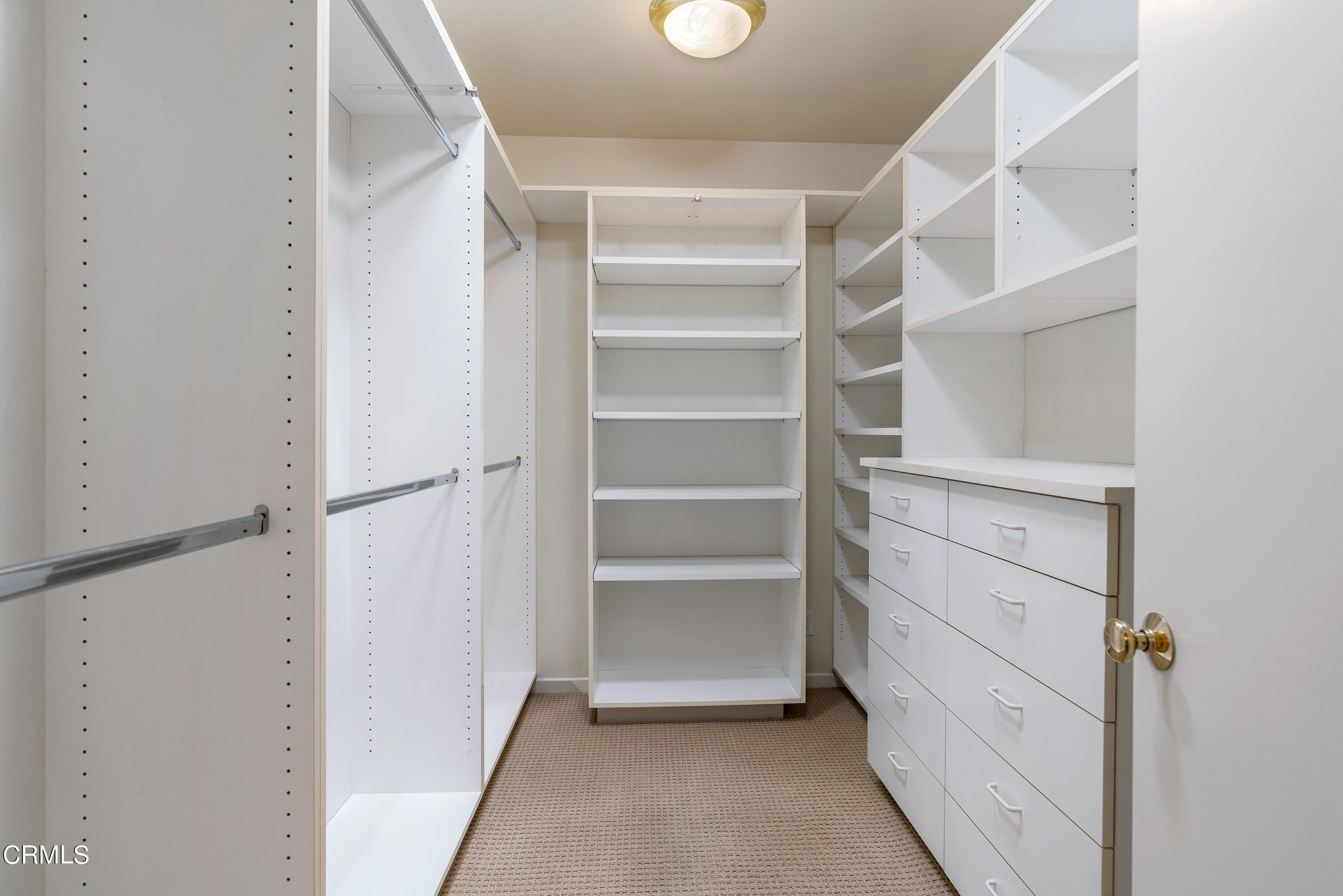 2155 Canyon Close Road Pasadena, CA 91107 - Photo 26 of 41 a view of walk in closet with empty racks