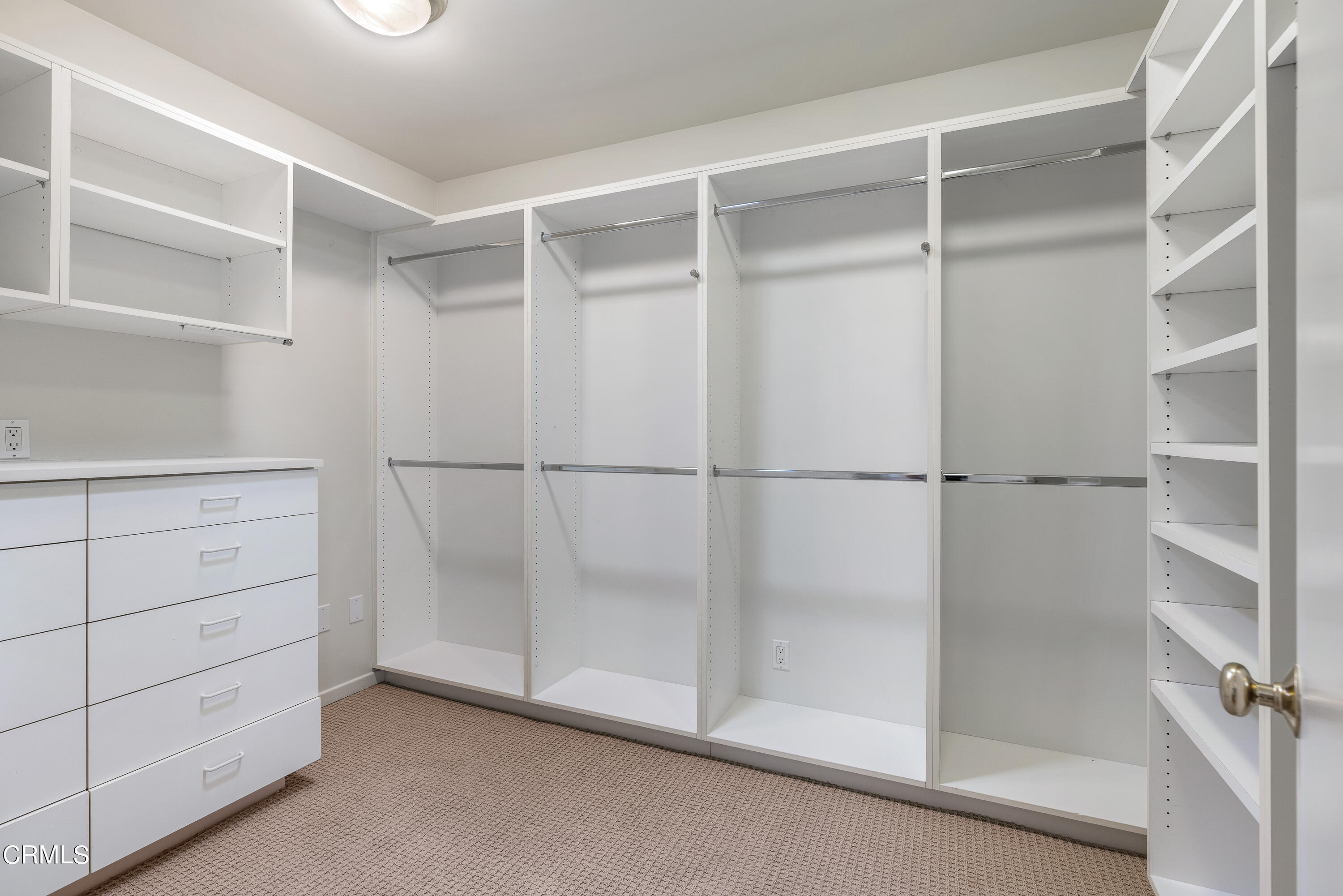 2155 Canyon Close Road Pasadena, CA 91107 - Photo 28 of 41 a view of walk in closet with empty racks