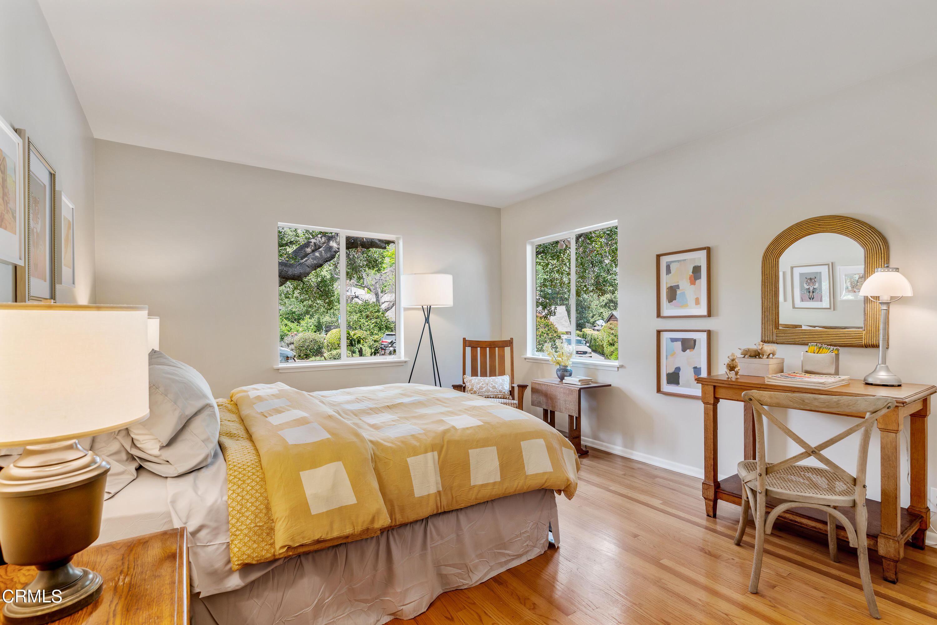 2155 Canyon Close Road Pasadena, CA 91107 - Photo 32 of 41 a bedroom with a bed a table and chair with wooden floor