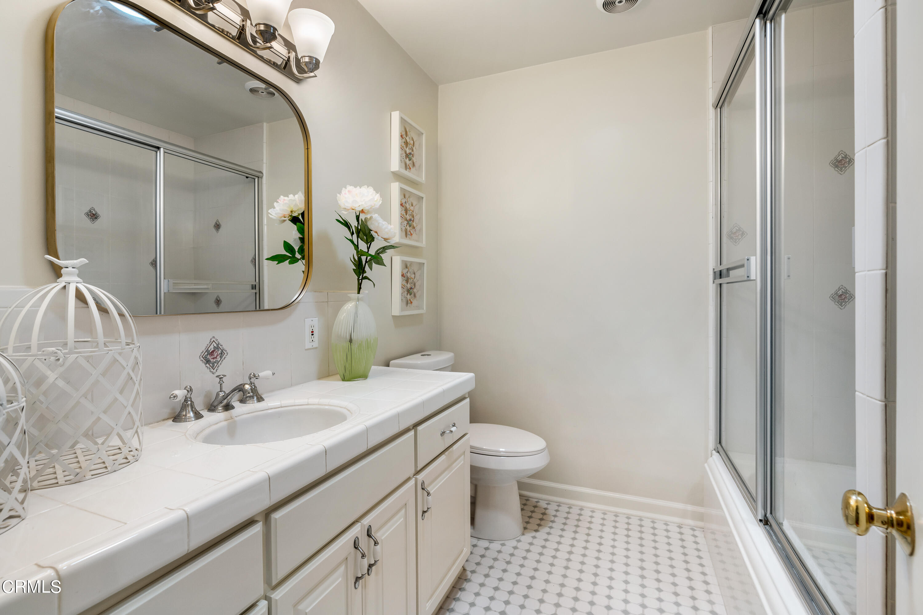 2155 Canyon Close Road Pasadena, CA 91107 - Photo 34 of 41 a bathroom with a sink a toilet and a mirror