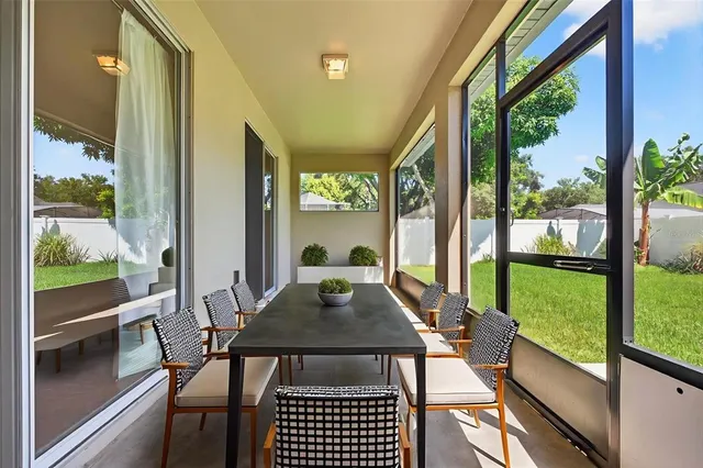an aerial view of house with a garden