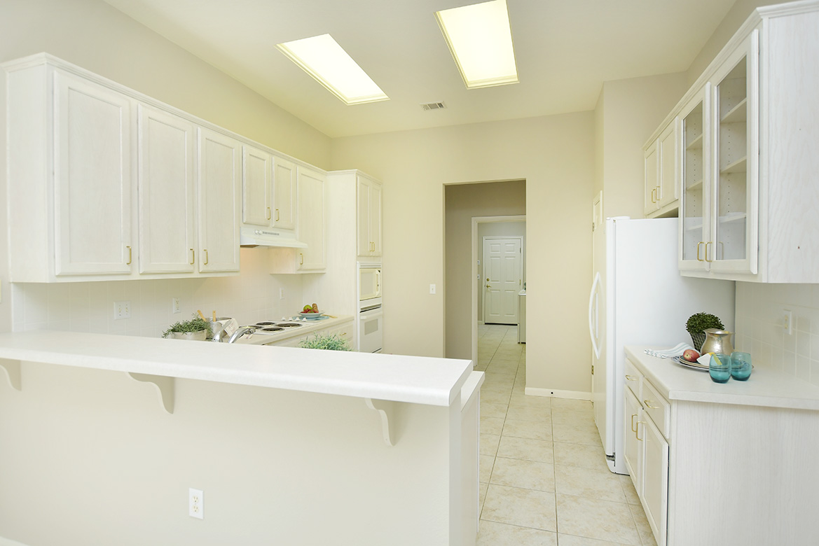 114 Lone Star Drive Georgetown, TX 78633 - Photo 13 of 30 Glass fronted upper cabinets provide a spot to display your special dishes.