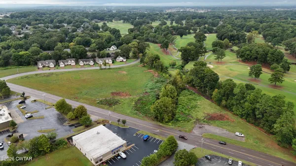 an aerial view of a house with a garden
