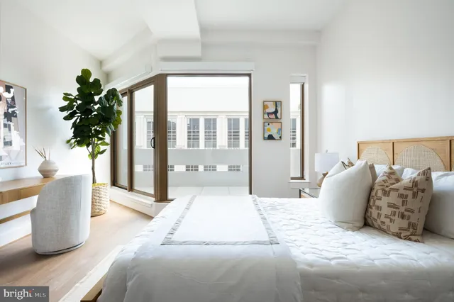 a bathroom with a sink toilet and mirror