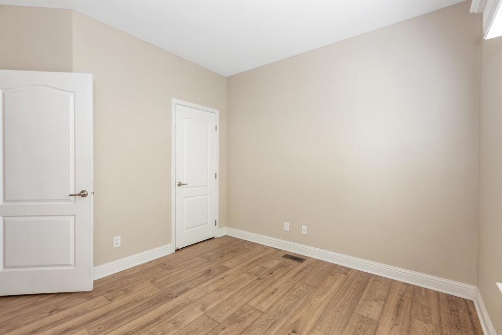 9500 Harritt Road, Unit 29 Lakeside, CA 92040 - Photo 26 of 32 a view of an empty room with wooden floor