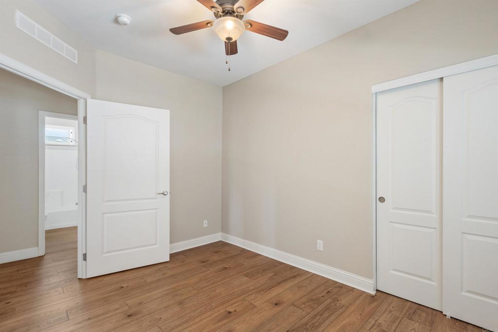 9500 Harritt Road, Unit 29 Lakeside, CA 92040 - Photo 29 of 32 a view of an empty room with wooden floor