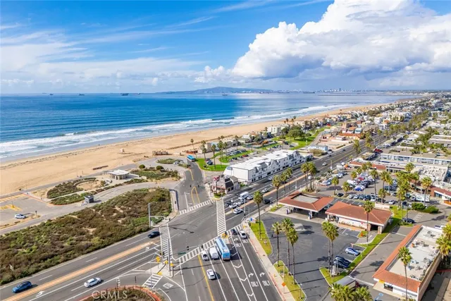 a view of city with ocean