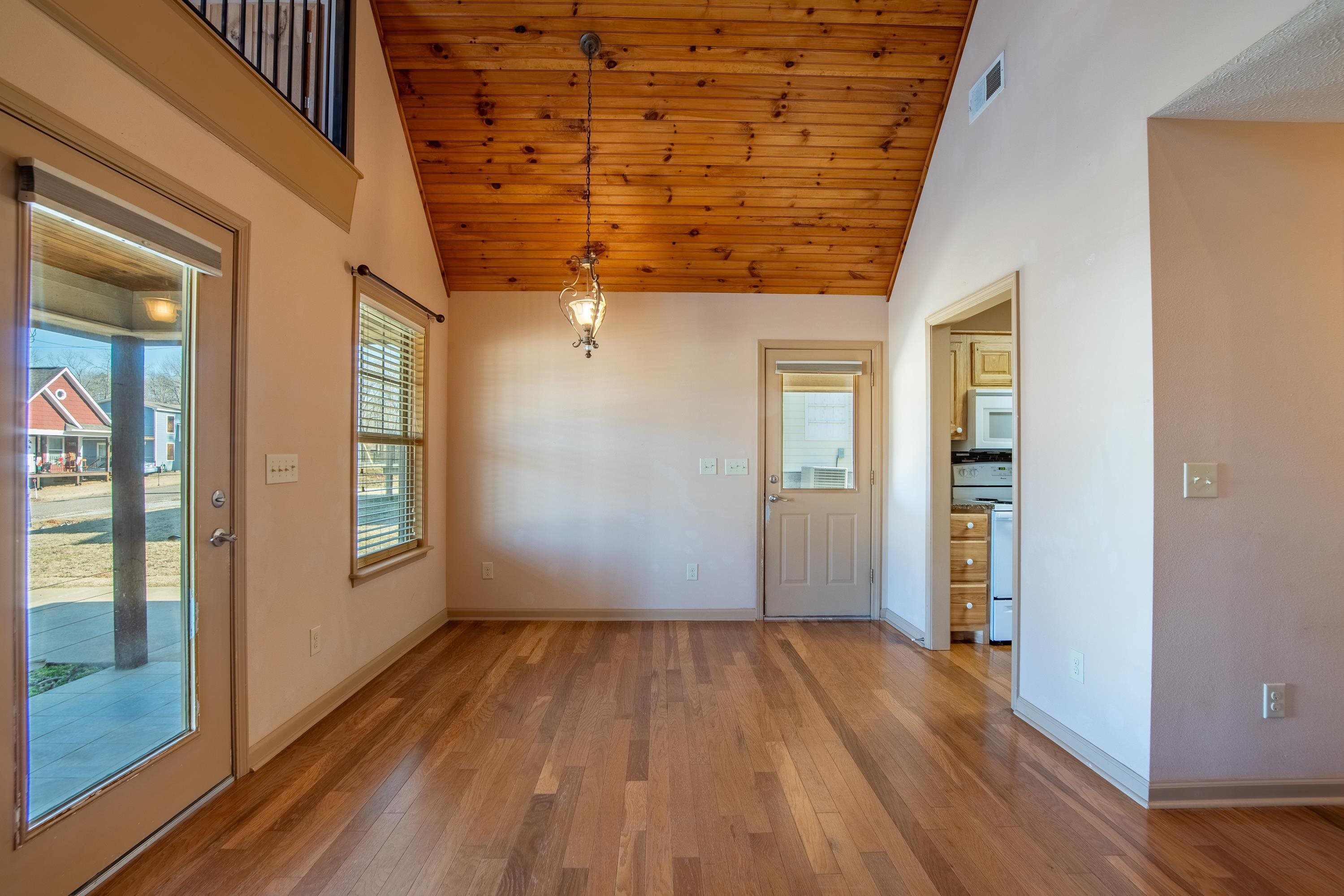 20 Bogey Loop Counce, TN 38326 - Photo 3 of 39 Interior space with wood ceiling, wood-type flooring, and high vaulted ceiling