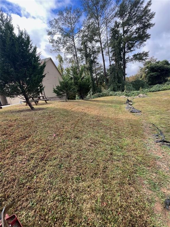 265 Arcado Road Northwest Lilburn, GA 30047 - Photo 3 of 5 a view of yard with tree