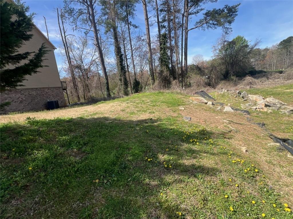 265 Arcado Road Northwest Lilburn, GA 30047 - Photo 4 of 5 a fire hydrant in the middle of a field