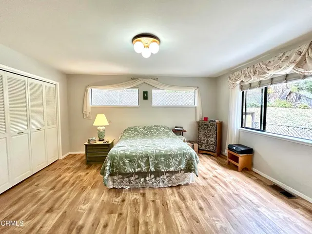 a kitchen with a sink appliances and cabinets