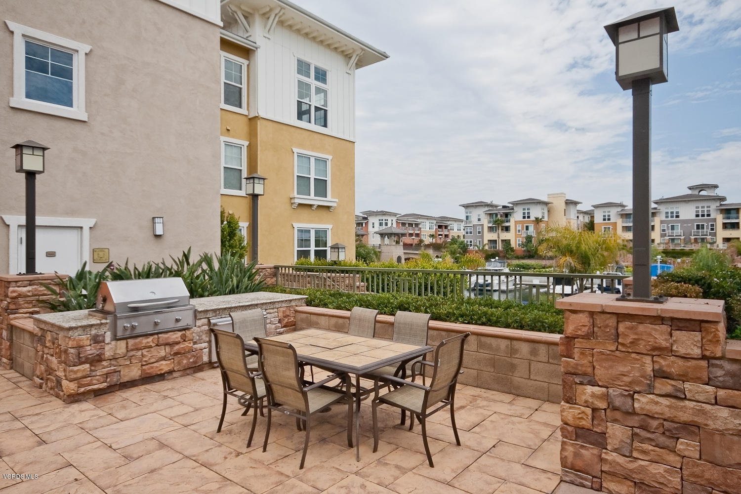 1533 Windshore Way Oxnard, CA 93035 - Photo 21 of 28 a view of a terrace with furniture and stove