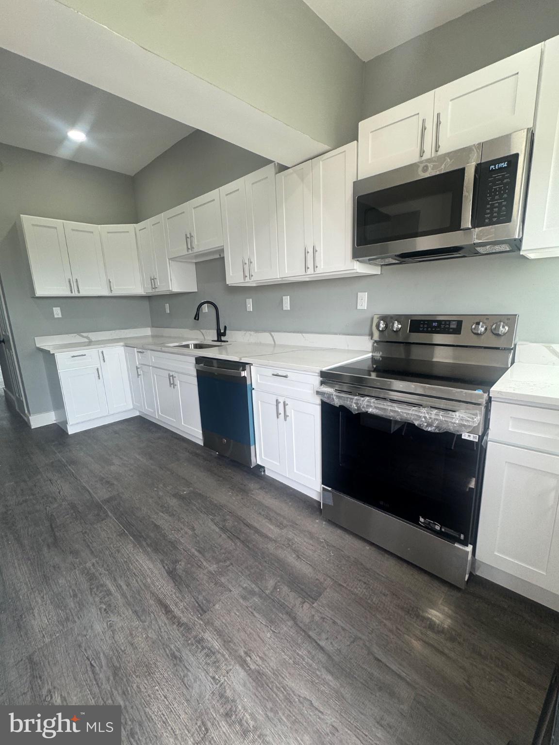 2811 East Preston Street Baltimore, MD 21213 - Photo 4 of 14 Modern kitchen with sleek finishes.