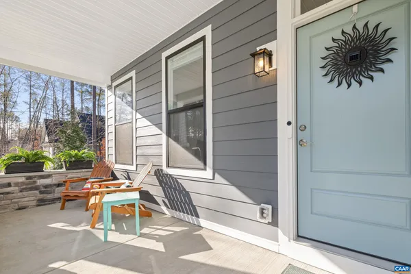 a view of balcony with furniture
