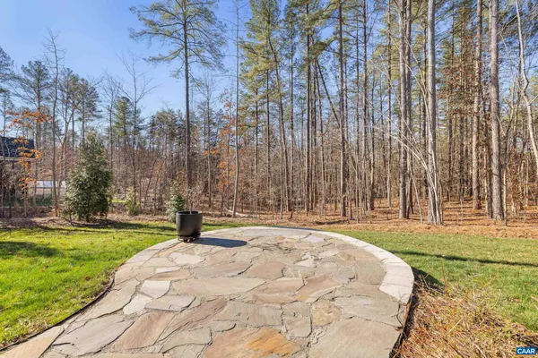 a outdoor living space with furniture and a potted plant
