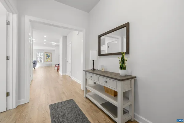 a kitchen with center island table and chairs in it