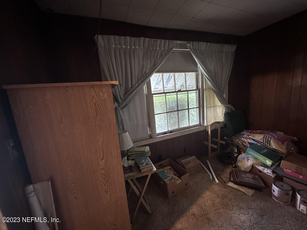 1760 Lilly Road East Jacksonville, FL 32207 - Photo 12 of 18 a room with air conditioner duct and window