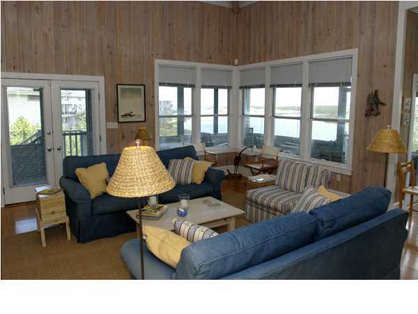 88 Don Bishop Road Santa Rosa Beach, FL 32459 - Photo 3 of 10 a living room with furniture and a large window
